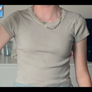 Plain beige baby tee from pacSun